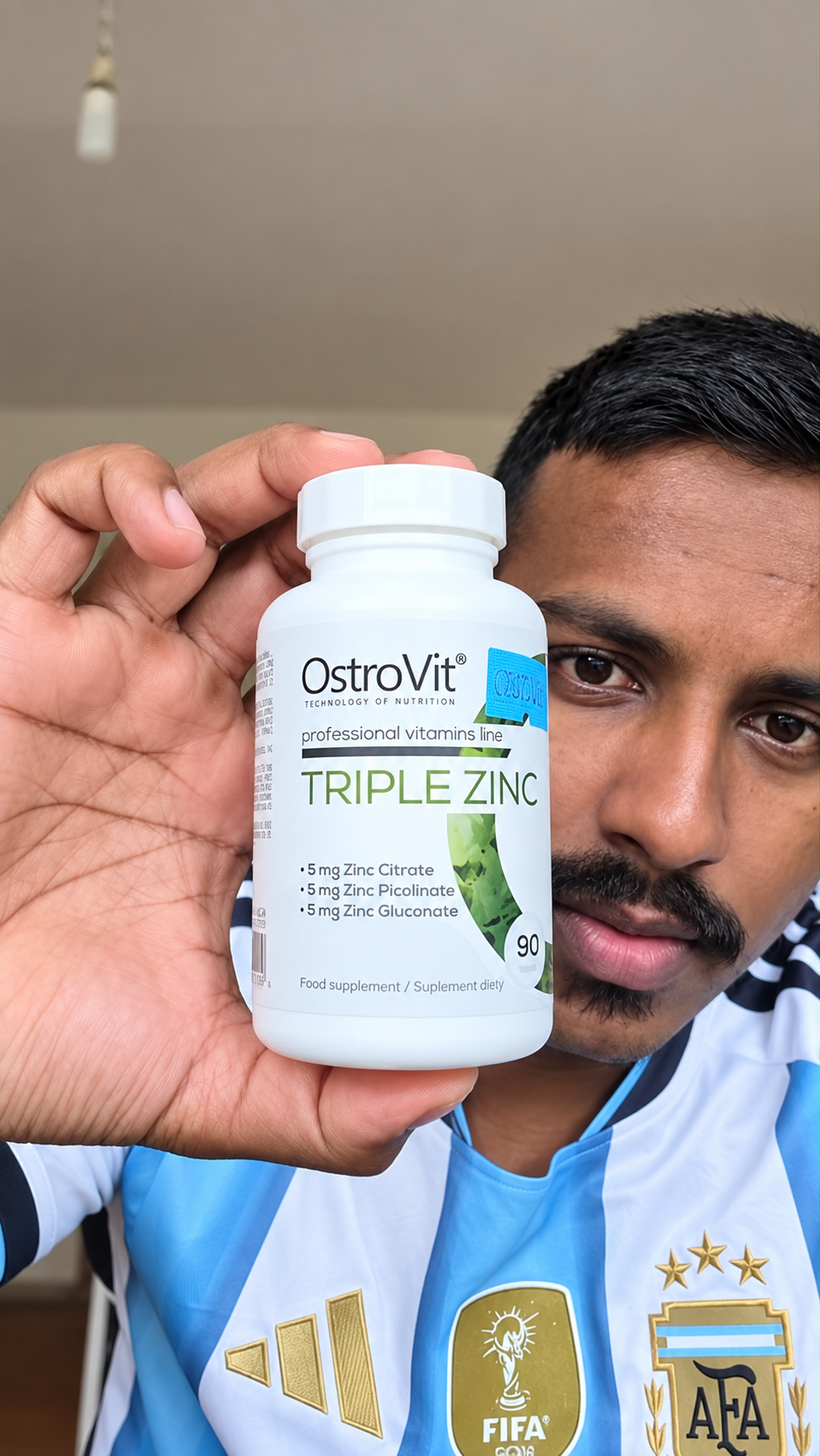 Dharvesh holding OstroVit Triple Zinc